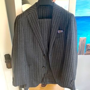 Charcoal pinstripe Suitsupply Havana Traveller 2 button suit